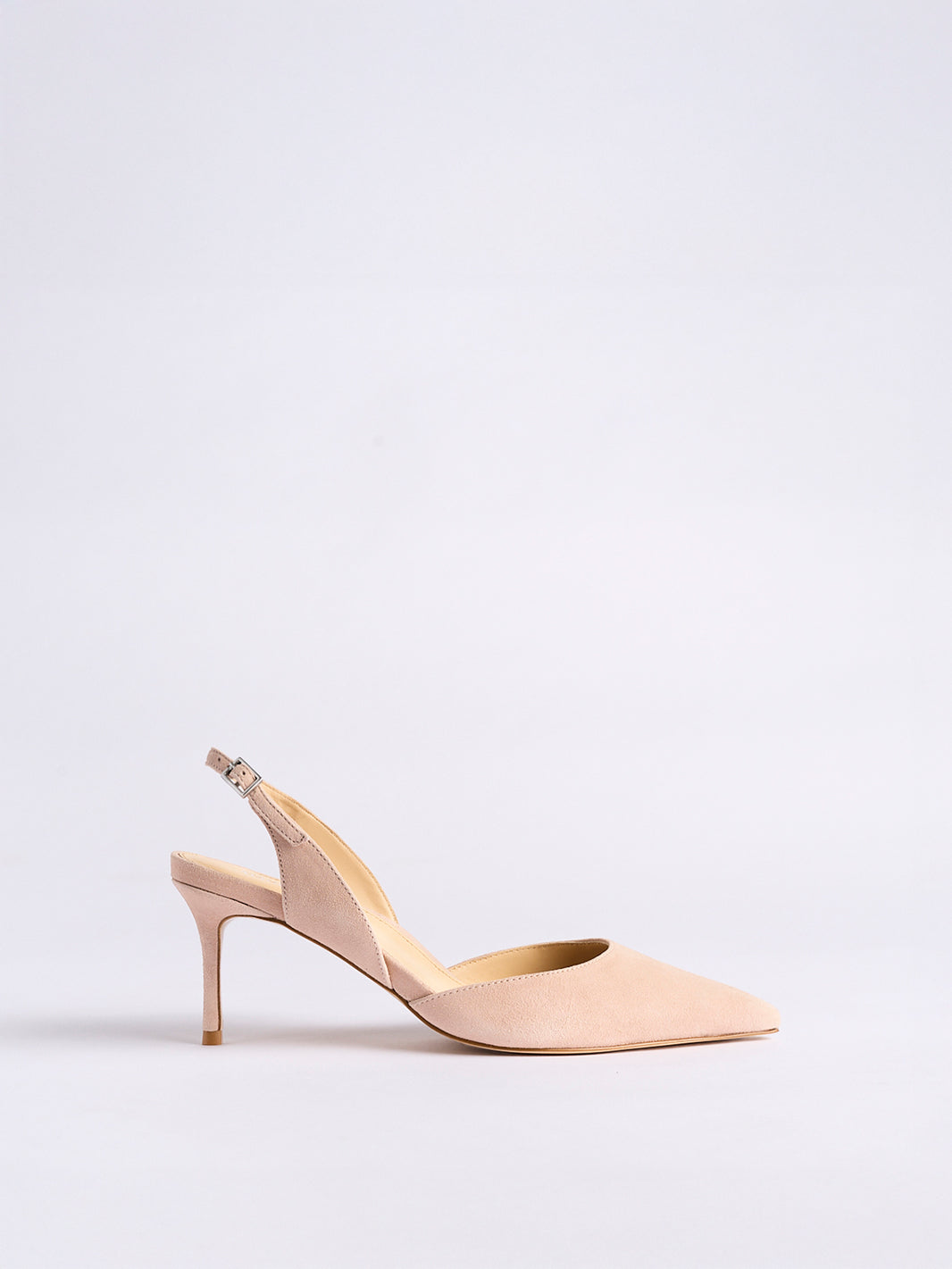 Profile view of a powder suede slingback  heel with a pointed toe.
