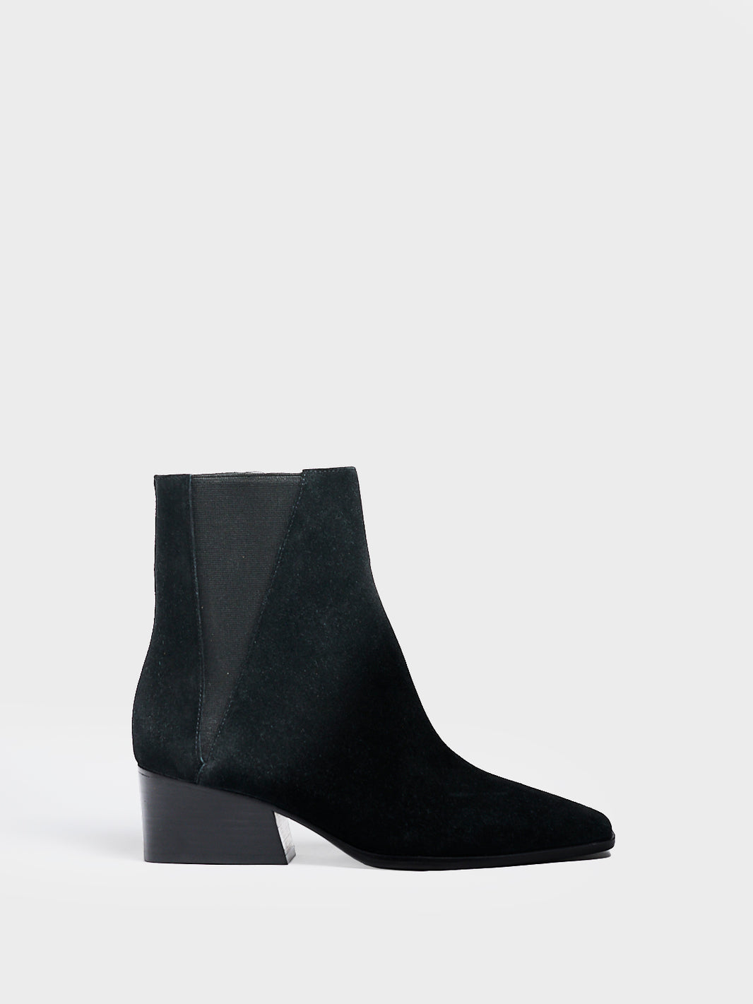 Profile view of a black suede chelsea boot with a zipper closure, square toe, and block heel. 