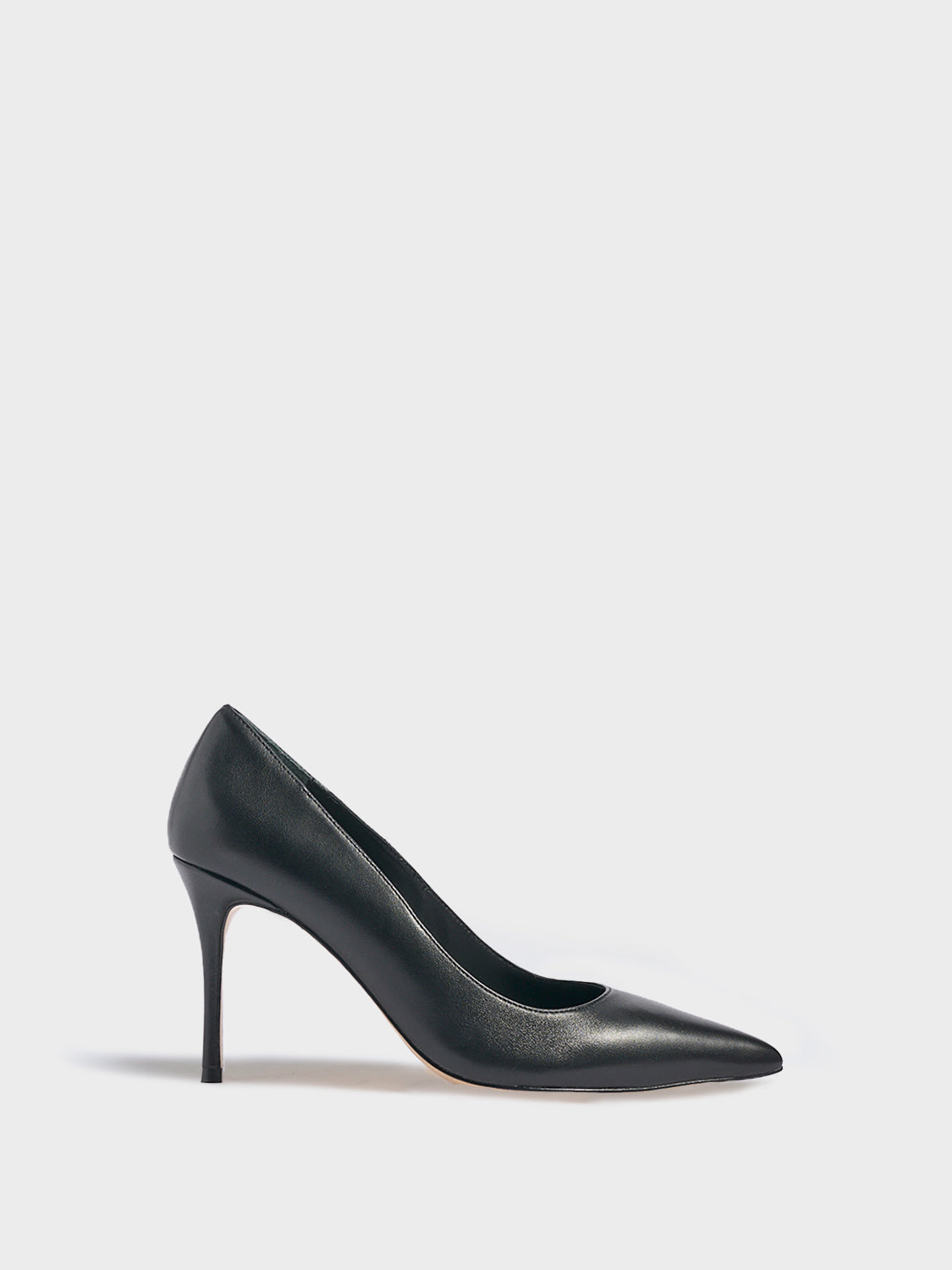 Profile view of a black leather high stiletto heel pump with a pointed toe.