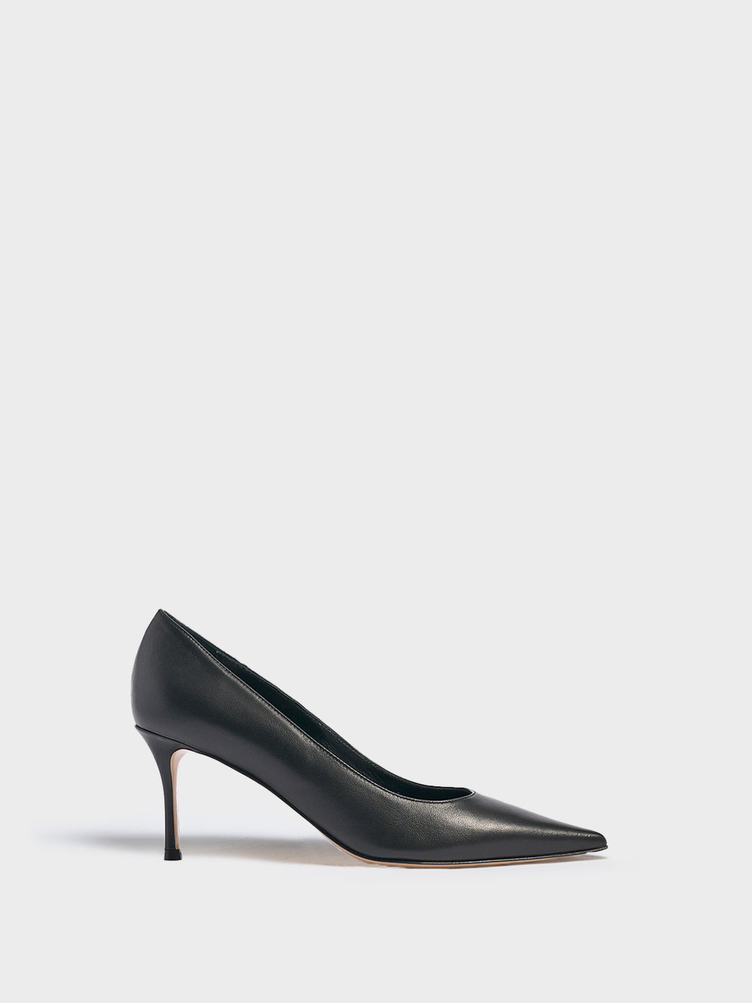Profile view of a black leather high stiletto heel pump with a pointed toe.