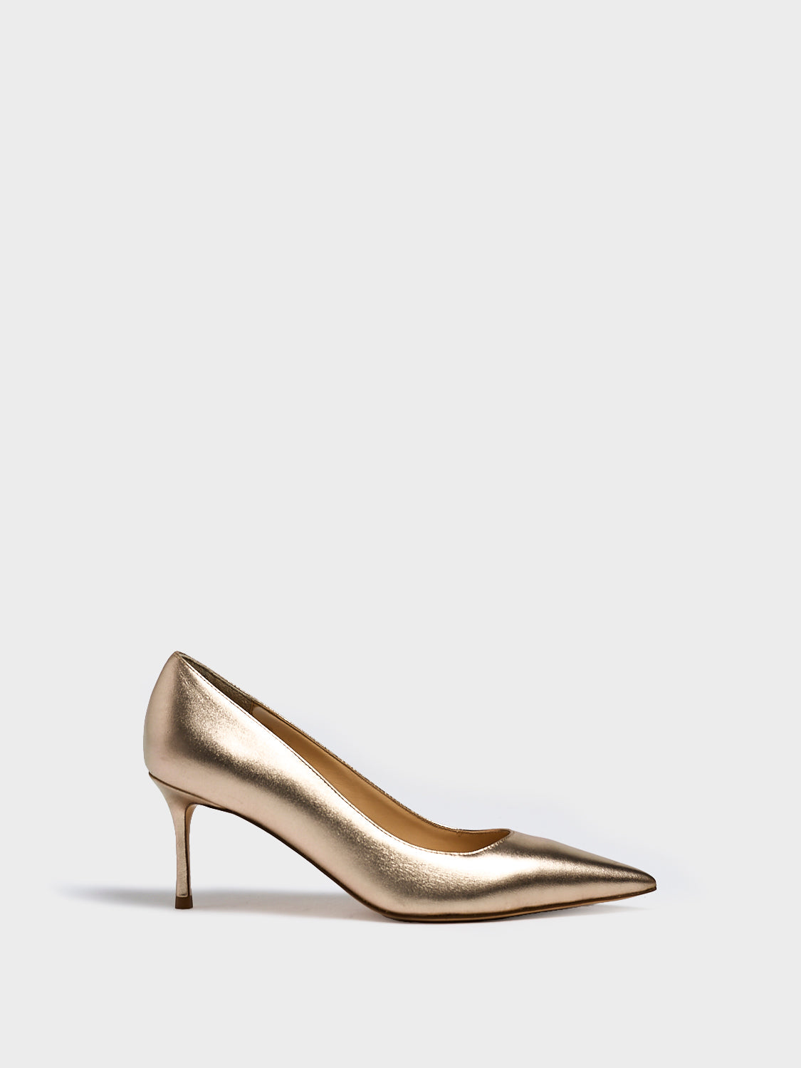 Profile view of a soft gold metallic leather high stiletto heel pump with a pointed toe.