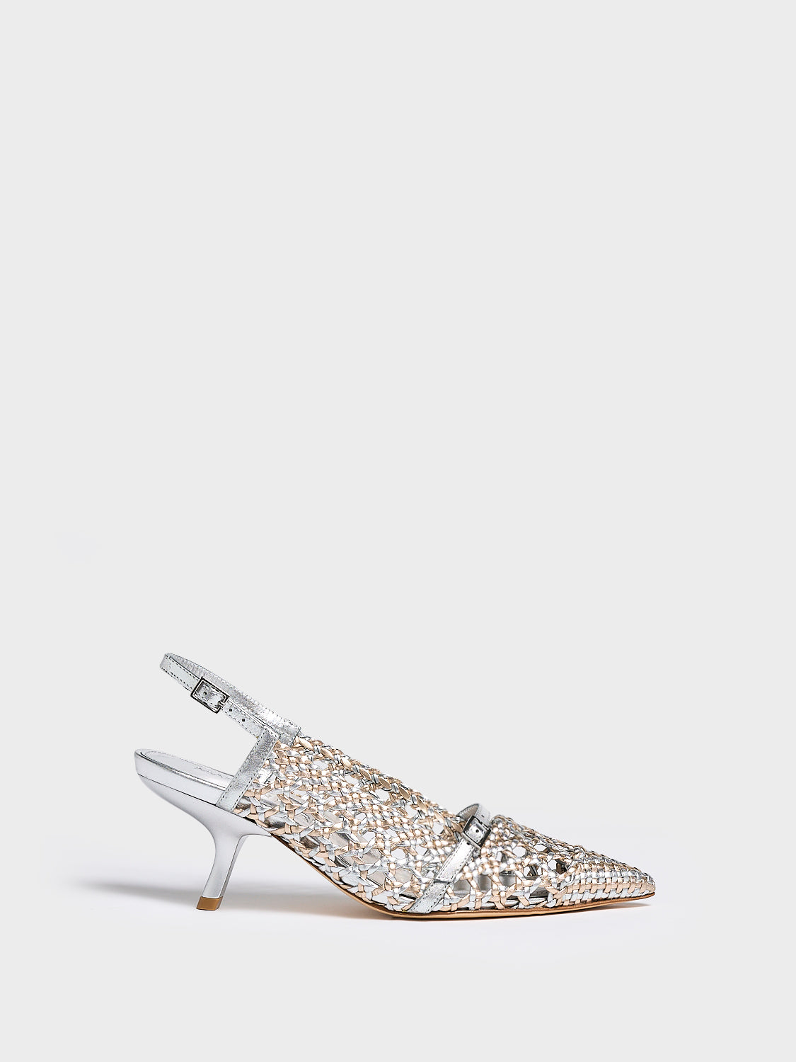 Profile view of a silver and gold metallic braided leather kitten heel with a slingback detail.