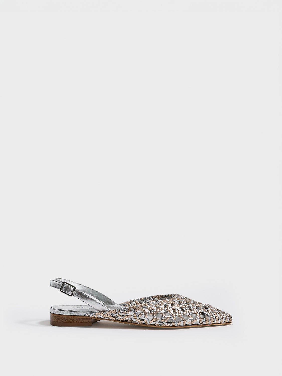 Profile view of a silver and gold metallic braided leather slingback flat.